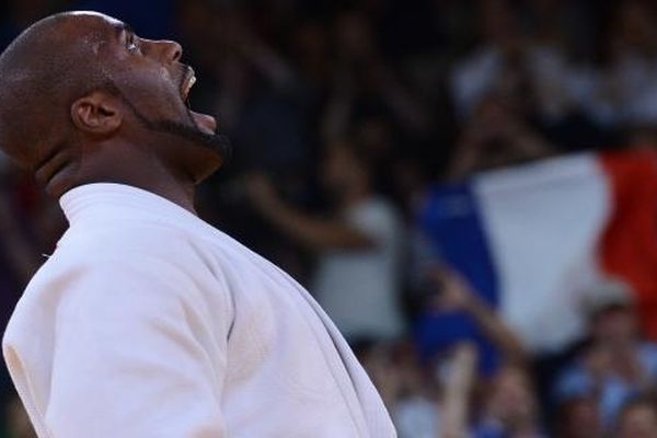 Teddy Riner exulte après sa victoire en finale de judo, catégorie de + de 100 kilos, le 3 août 2012 à Londres, lors des Jeux Olympiques.