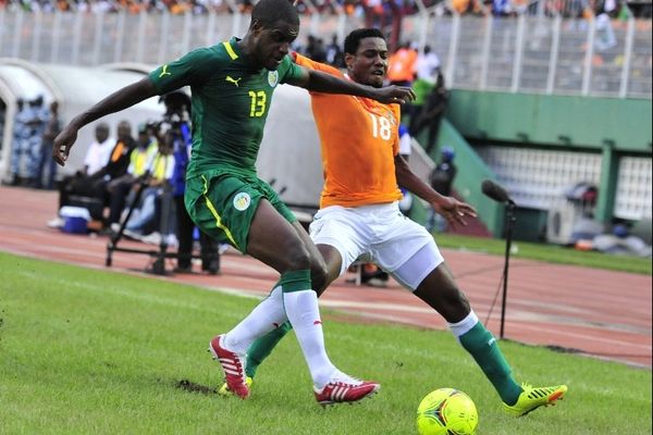 Jacques Doudou Faty ( à gauche) à Abidjan en septembre 2012 lors de l' African Cup of Nations