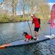 Christophe Mathevet sur la Deûle, perché sur son paddle mercredi 27 mars 2024 à Lille (Nord).