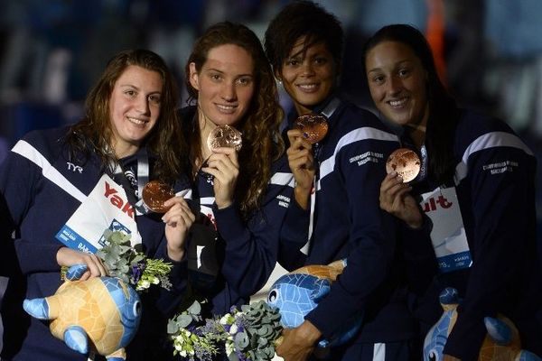 La France, avec Camille Muffat, Charlotte Bonnet, Mylène Lazare, et Coralie Balmy a fini 3e, en 7 min 48 sec 43/100e