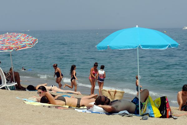 Rien de mieux qu'un parasol pour se protéger du soleil (Archives)