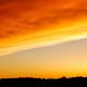 Le sable du Sahara colore le ciel en jaune et orange - Photo d'illustration