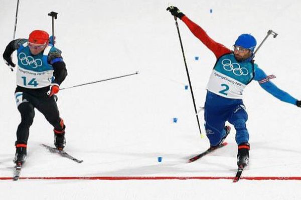 Martin Fourcade s'impose à la photo finish en mass start. Et une 2e médaille d'or aux J.O en Corée - 18 février 2018.