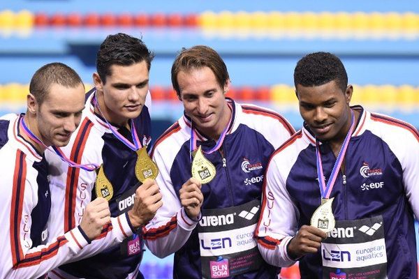 Jérémy Stravius, Florent Manaudou, Fabien Gilot et Mehdi Metella, champions d'Europe du relais 4x100m à Berlin.