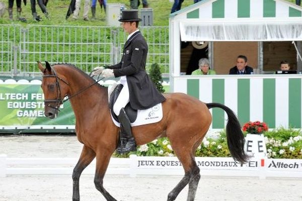 Mark TODD (NZL) sur son cheval LEONIDAS II. Concours de dressage au Haras national du Pin (Le Pin-au-Haras) ce jeudi 28 Août 2014 dans le cadre des Jeux Equestres Mondiaux.