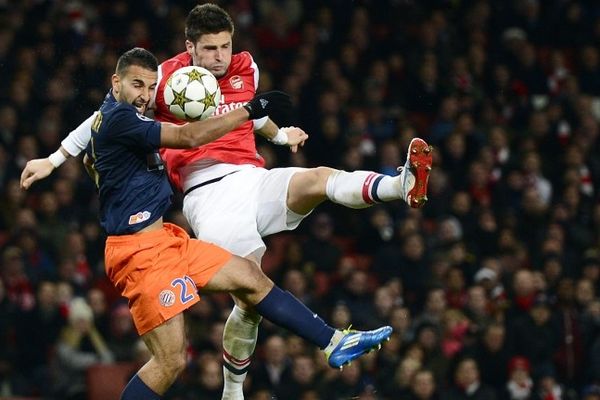 Londres Colney - le Montpelliérain Abdelhamid El Kaoutari en lutte avec Olivier Giroud ex-montpelliérain d'Arsenal - 21 novembre 2012.