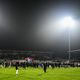 Les joueurs et supporters de Bourgoin Jallieu célèbrent sur le terrain après la victoire de l'équipe à la fin des 32èmes de finale de la Coupe de France entre le FC Bourgoin-Jallieu et l'Olympique Lyonnais (Lyon) au stade Pierre-Rajon de Bourgoin-Jallieu.