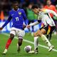L'attaquant de l'équipe de France Ousmane Dembélé face à l'Allemand Jamal Musiala lors de la défaite des Bleus 2-0 à Lyon, le 23 mars 2024.
