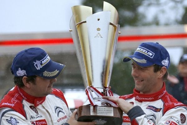 Sébastien Loeb et son co-pilote Daniel Elena lors de la remise des prix du Rallye Monte-Carlo.