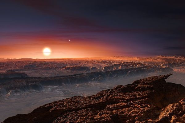 Vue d’artiste de la planète Proxima b et son étoile Proxima du Centaure.