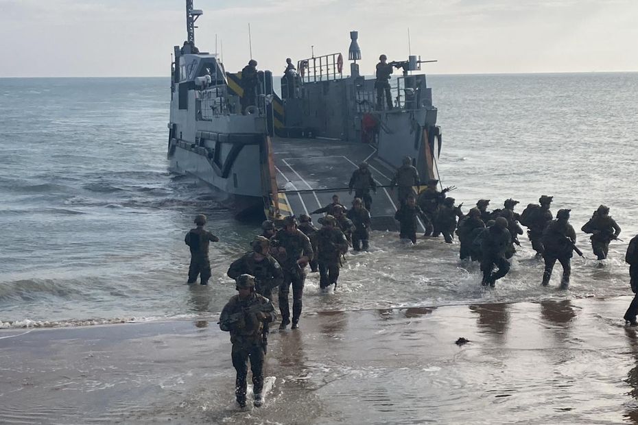 at Omaha seashore, the French military reenacts D-Day