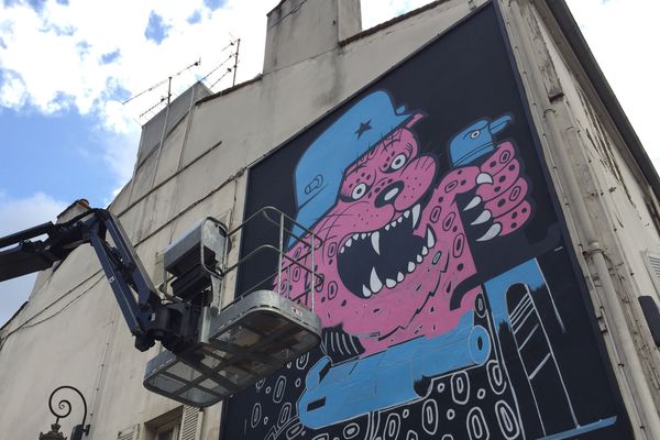 Une fresque éphémère de l'artiste Poch réalisée sur un mur de de 7 mètres sur 4  à Dijon.