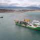 Le Barcarès (Pyrénées-Orientales) - le navire câblier "Viking Neptun" installe le câble électrique sous-marin entre les éoliennes et la terre - mai 2024.