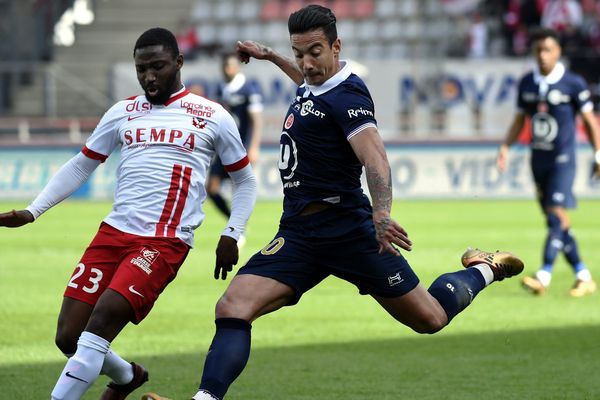 Diego Rigonato (à droite) au prises avec le Nancéen Athnoy Koura, le 31 mars 2018.