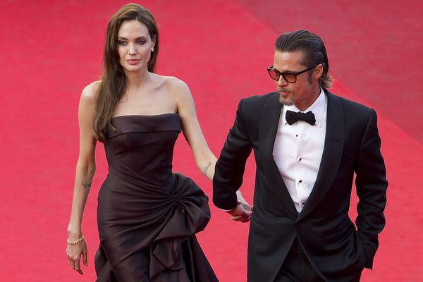 Angelina Jolie et Brad Pitt sur le tapis rouge du Festival de Cannes, le 16 mai 2011. Le couple n'était pas encore divorcé.