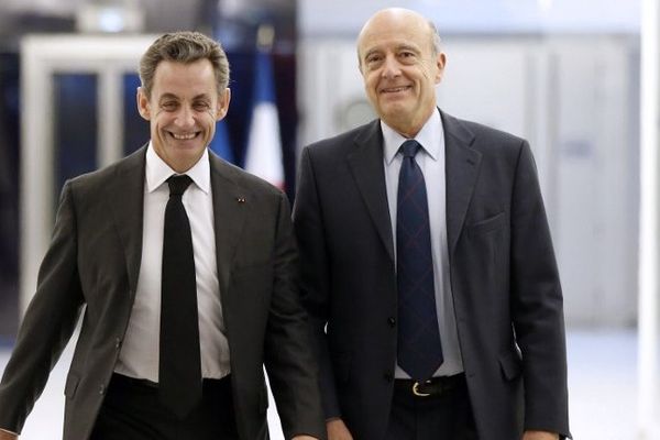 Nicolas Sarkozy et Alain Juppé au siège de l'UMP le mercredi 3 décembre 2014