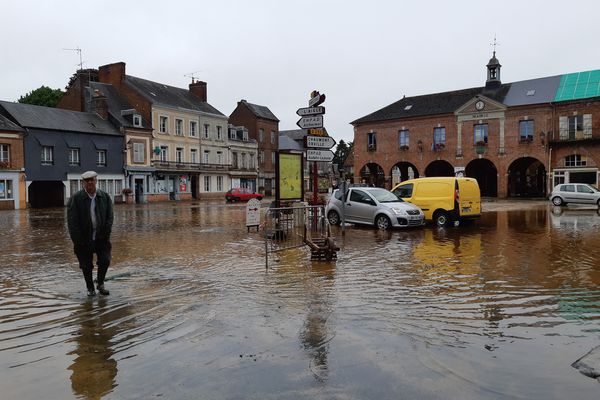 Une place inondée au Sap-en-Auge (Orne), en juin 2021.