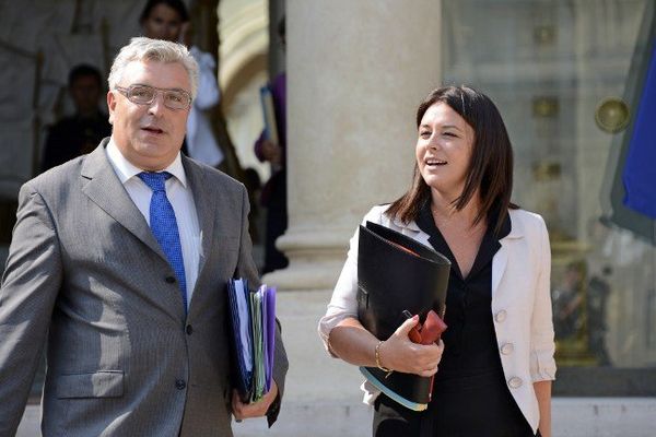 Bernard Cuvillier et Sylvia Pinel, ministre de l'artisanat, du commerce et du tourisme, à la sortie de l'Elysée le 28 août 2013