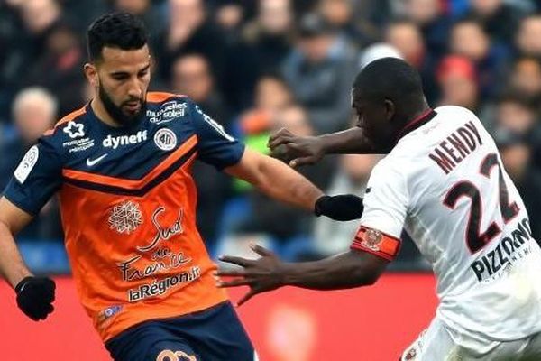 Abdelhamid El Kaoutari passe Nampalys Mendy (AFP)