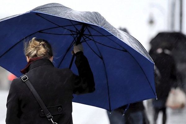 Manteaux et parapluies sont de rigueur. 