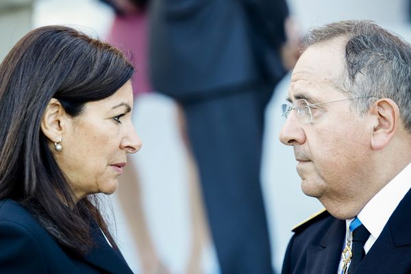 Anne Hidalgo, maire de Paris et Michel Delpuech, préfet de police, au défilé du 14-juillet sur les Champs-Elysées.