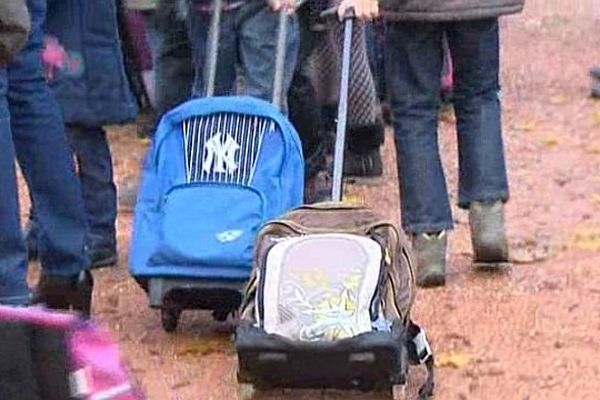 Des parents et des syndicats de l'éducation appellent à la grève mercredi 13 et jeudi 14 novembre 2013 pour protester contre la réforme des rythmes scolaires 