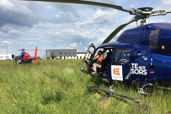 Dans tout le Bessin, les hélicoptères ont surpris la population dimanche dès la fin d'après-midi. On les retrouve ici à St Contest , près de Caen, derrière les locaux de la CCI. 