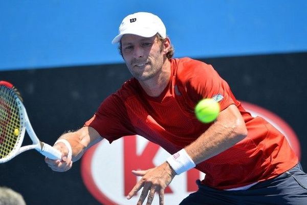 Stephane Robert pendant le match contre le polonais Michal Przysiezny à l'Open de tennis d'Australie à Melbourne - 16 janvier 2014