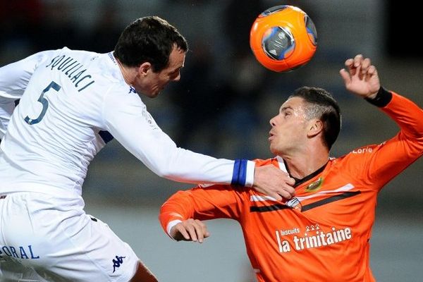  Sébastien Squillaci et  Jeremie Aliadiere  au stade Moustoir à Lorient le 1er mars 2014 