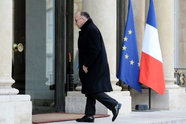 Bernard Cazeneuve arrivant à l'Elysée après les attaques sur Bruxelles, ce mardi 22 mars 2016.