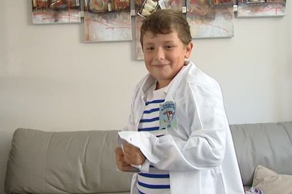 Erwan, 9 ans, jouteur qui participe à la 274e édition des fêtes de la Saint-Louis - 19 août 2016