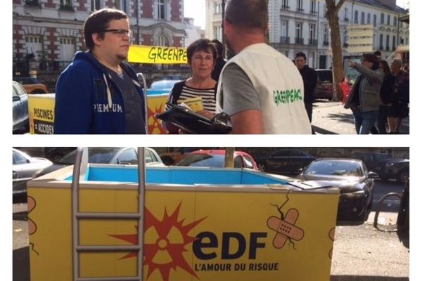 Une dizaine de militants Greenpeace ont installé une piscine en carton symbolisant
la "fragilité des piscines d'entreposage du combustible usé"  au milieu du marché aux fleurs. Bd Béranger à Tours. 14 octobre 2017 