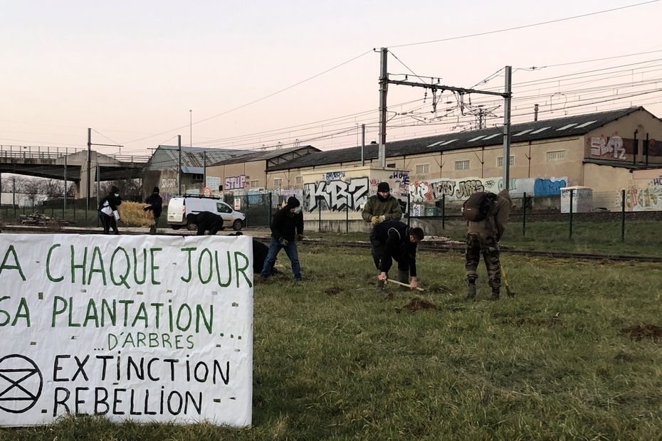 the Extinction Rebellion movement plants 200 trees in an industrial area in Dijon